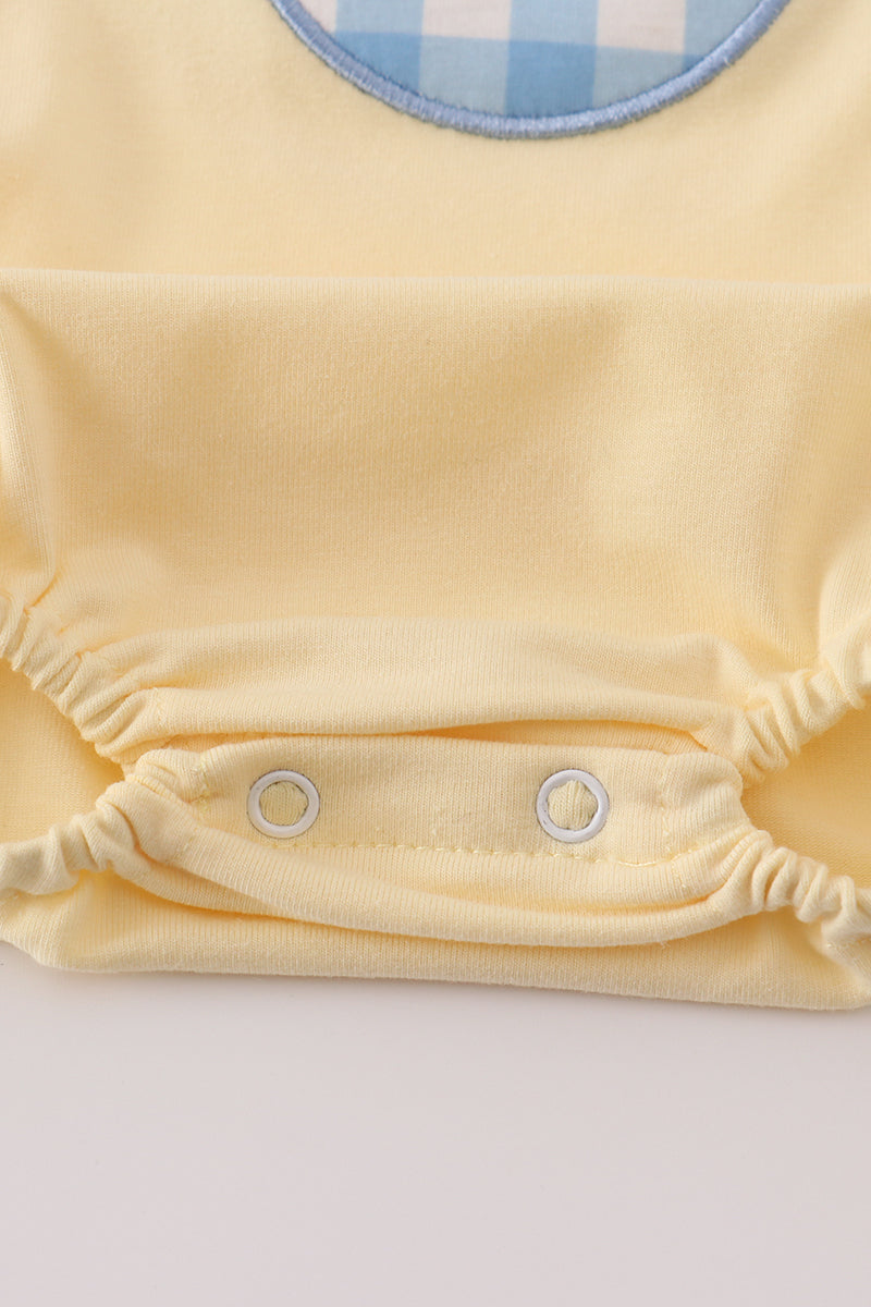 Yellow character applique bubble