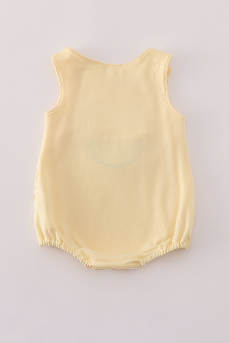 Yellow character applique bubble